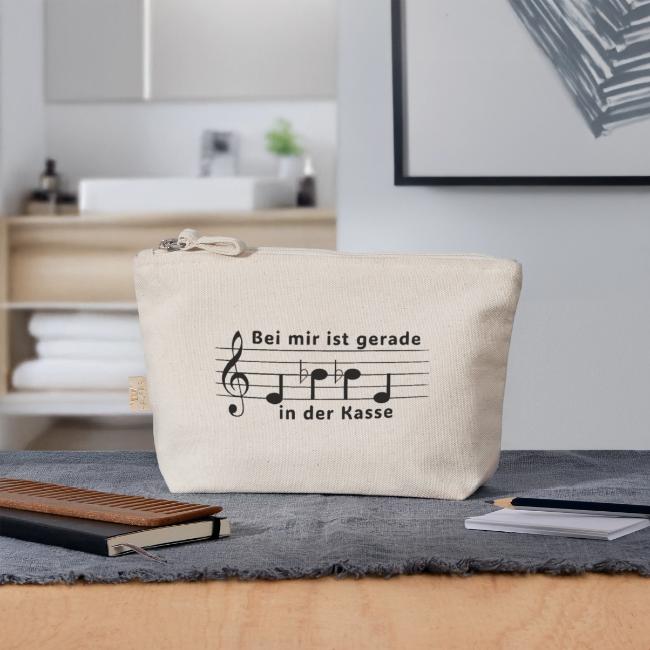 Bio-Täschchen mit humorvollem Musik-Spruch „Ebbe in der Kasse“ in Notenschrift